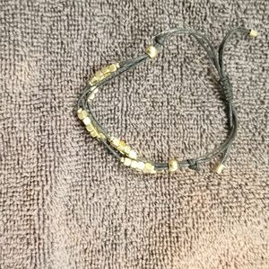 Black and gold pull bracelet